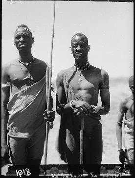Featured is a c 1936 photo of a pair of Shiluki tribesmen from Malakal, Sudan.  Courtesy of the G. Eric and Edith Matson Photographic Collection at the US Library of Congress.